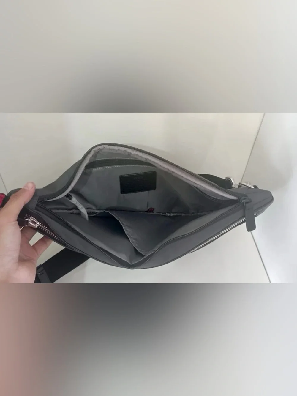 Tumi Black Sling Crossbody Bag with Silver Hardware